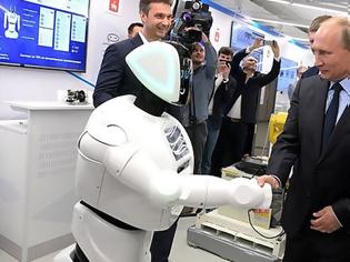 Φωτογραφία για Σε τεχνολογική έκθεση: Και τα ρομπότ «λυγίζουν» στη γοητεία του Πούτιν (video)