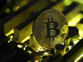Φωτογραφία για Πρώτη φορά πάνω από τα 7.000 δολάρια η αξία του Bitcoin