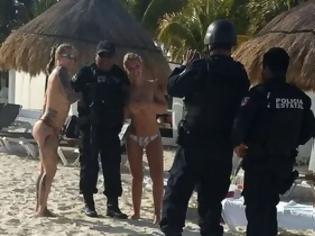 Φωτογραφία για Mεξικό: Απολύθηκαν αστυνομικοί που φωτογραφήθηκαν με ημίγυμνες τουρίστριες