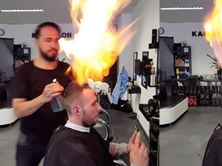 Φωτογραφία για Τι κάνει ο παλαβιάρης;...Κομμωτής χρησιμοποιεί φωτιά για να χτενίσει τα μαλλιά των πελατών του