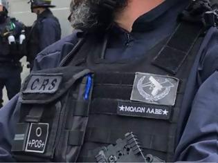 Φωτογραφία για Γάλλος αστυνομικός έραψε «Μολών λαβέ» στη στολή του