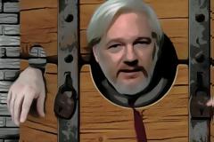 Assange Held at “Britain’s Guantanamo Bay” as UN Urges Fair Trial