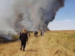 Φωτογραφία για Επιχείρηση καμμένη γη στη Συρία : Oι τελευταίοι μαχητές του ISIS καίνε σοδειές και καταστρέφουν καλλιέργειες