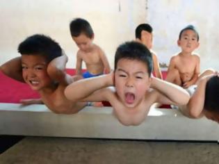 Φωτογραφία για Προπόνηση ή βασανιστήρια: Στα άδυτα των παιδικών γυμναστηρίων της Κίνας (εικόνες)