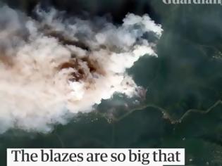 Φωτογραφία για Ο καπνός από τις φωτιές σε Σιβηρία, Γροιλανδία και Αλάσκα φαίνεται από το Διάστημα (video)