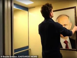 Φωτογραφία για Έβαλαν το πορτρέτο του Β. Πούτιν σε ασανσέρ και... φάνηκε τι σκέφτονται γι' αυτόν οι Ρώσοι  (video)