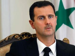 Φωτογραφία για Ο Ασαντ «κλείνει το μάτι» στον Χαφτάρ