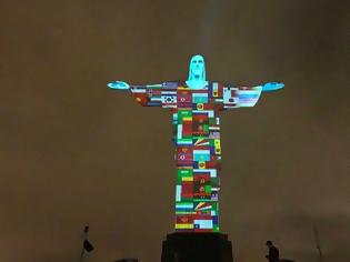 Φωτογραφία για Βραζιλία: Το άγαλμα του Χριστού στο Ρίο φωτίστηκε με σημαίες χωρών που έχουν πληγεί από τον κορωνοϊό (video)