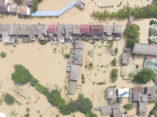 Φωτογραφία για Φονικές πλημμύρες στην Κίνα: Τουλάχιστον 140 νεκροί ή αγνοούμενοι