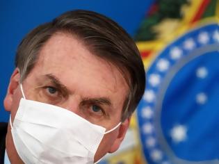 Φωτογραφία για Όσο παραμένει σε επικίνδυνο επίπεδο η επιδημία στη Βραζιλία τόσο αυξάνεται η δημοτικότητα του Μπολσονάρου