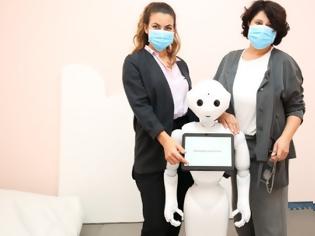 Φωτογραφία για Κοινωνικό ρομπότ στο Παπαγεωργίου εξοικειώνει αυτιστικά παιδιά με τις χρηματικές συναλλαγές