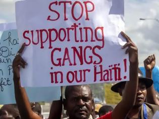 Φωτογραφία για Αϊτή: 15 νεκροί από σφαίρες, ανάμεσά τους ένας δημοσιογράφος και μια ακτιβίστρια
