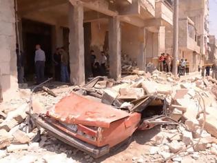 Φωτογραφία για Συνεχίζονται οι βομβαρδισμοί και οι μάχες στο Χαλέπι