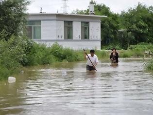 Φωτογραφία για Φονικές πλημμύρες στην Κίνα: Δεκάδες νεκροί και αγνοούμενοι -  Έχουν παγιδευτεί 450 εργαζόμενοι!!!