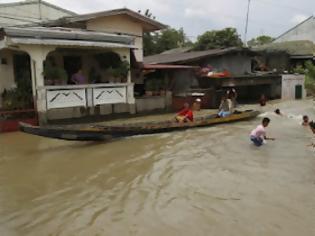Φωτογραφία για Δύο εκατομμύρια πληγέντες από τις πλημμύρες στις Φιλιππίνες