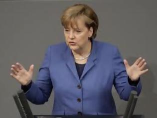 Φωτογραφία για Μέρκελ: «Απόλυτη πολιτική βούληση» για σταθερό ευρώ