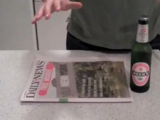 Φωτογραφία για VIDEO: Πώς να ανοίξεις μπουκάλι με μια… εφημερίδα