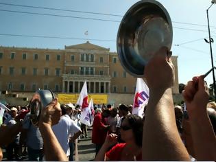 Φωτογραφία για Θερμή υποδοχή στην καγκελάριο Μέρκελ