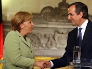 Φωτογραφία για Merkel: Ελπίζω κι εύχομαι να μείνετε στην Ευρωζώνη ΒΙΝΤΕΟ...!!!