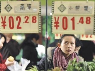 Φωτογραφία για Αδυναμίες στην οικονομία επιβραδύνουν τον πληθωρισμό στην Κίνα
