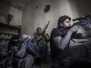 Φωτογραφία για Συρία: Οι αντάρτες πολεμούν το καθεστώς αγοράζοντας όπλα από το... καθεστώς