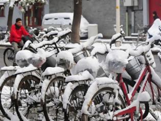 Φωτογραφία για Μας λένε ότι η χειραγώγηση του καιρού δεν είναι δυνατή σωστά;...Λάθος!!! Τεχνητή χιονοθύελλα φέρνει το χάος στο Πεκίνο