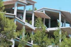Ξεκλειδώνουν άδειες, αποπερατώσεις και μεταβιβάσεις αυθαιρέτων