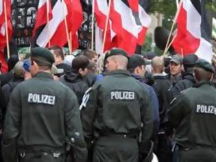 Φωτογραφία για Αυστρία: Συλλήψεις υπόπτων για συμμετοχή σε συμμορία νεοναζί