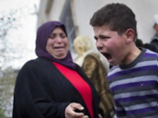 Φωτογραφία για H φωτογραφία του παλαιστίνιου πιτσιρικά που σόκαρε τον πλανήτη