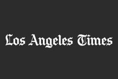 Times: Η φωτογραφία του Κύπριου πατέρα με το μωρό αγκαλιά που κάνει τον γύρο του κόσμου