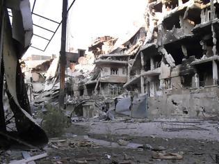 Φωτογραφία για Τουλάχιστον 15 νεκροί, ανάμεσά τους εννέα παιδιά, από βομβαρδισμό της κουρδικής συνοικίας στο Χαλέπι