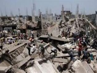 Φωτογραφία για Μπαγκλαντές: Αποζημίωση από όμιλο σούπερ μάρκετ στους συγγενείς των θυμάτων κατάρρευσης κτιρίου