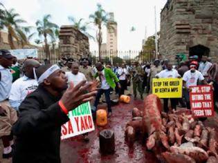Φωτογραφία για Κένυα: Διαμαρτυρία με...γουρούνια έξω από το κοινοβούλιο