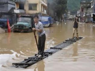 Φωτογραφία για Τριάντα τρεις νεκροί από τις καταιγίδες στην Κίνα