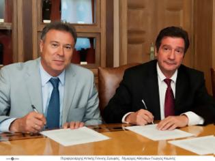 Φωτογραφία για Γ. Σγουρός και Γ. Καμίνης υπέγραψαν την Προγραμματική Σύμβαση για την κατασκευή και λειτουργία ΣΜΑ στον Ελαιώνα