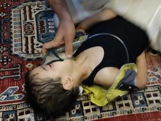 Φωτογραφία για Έγκλημα χωρίς τιμωρία στη Συρία - Η απεγνωσμένη προσπάθεια να σώσουν
μικρά παιδιά από το νευροπαραλυτικό αέριο