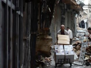 Φωτογραφία για Οι κάτοικοι της Δαμασκού ψάχνουν προμήθειες και καταφύγια