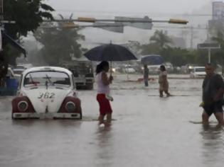 Φωτογραφία για Μεξικό: Φονικό πέρασμα τυφώνα και τροπικής καταιγίδας