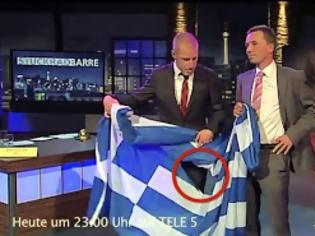 Φωτογραφία για Αρχηγός κόμματος στην Γερμανία σκίζει την Ελληνική σημαία σε τηλεοπτική εκπομπή!