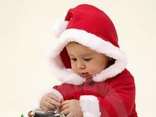 Φωτογραφία για Δείτε πως αντιδρά ένα μωράκι  στο πρώτο του χριστουγεννιάτιο δώρο!