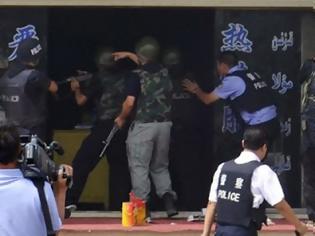 Φωτογραφία για Κίνα: Η αστυνομία σκότωσε οκτώ άτομα στη διάρκεια επίθεσης σε αστυνομικό τμήμα