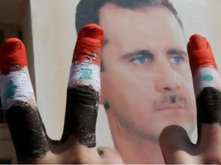 Φωτογραφία για Η Telegraph στη Συρία: Ενώ πέφτουν οι βόμβες, ο λαός συσπειρώνεται γύρω από τον Μπασάρ αλ Άσαντ