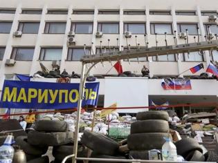 Φωτογραφία για Οι ουκρανικές δυνάμεις ανέκτησαν το δημαρχείο της Μαριούπολης