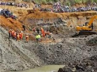 Φωτογραφία για Ξεθάβουν νεκρούς στο παράνομο χρυσωρυχείο της Κολομβίας
