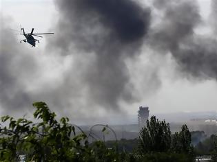 Φωτογραφία για 49 στρατιώτες νεκροί από κατάρριψη ουκρανικού αεροσκάφους από φιλορώσους αυτονομιστές