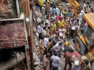 Φωτογραφία για Ινδία-9 νεκροί από κατάρρευση κτιρίου