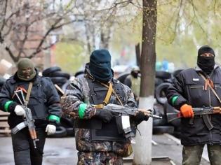 Φωτογραφία για Επιθέσεις ουκρανικών στρατευμάτων σε αυτονομιστές, λίγο μετά από την ανακοίνωση του Ποροσένκο ότι η χώρα θα απαλλαγεί από τα «παράσιτα»