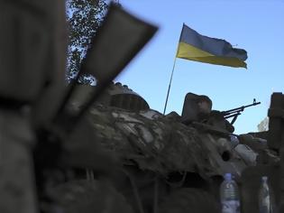 Φωτογραφία για Η ουκρανική σημαία κυματίζει στο δημαρχείο του Σλαβιάνσκ