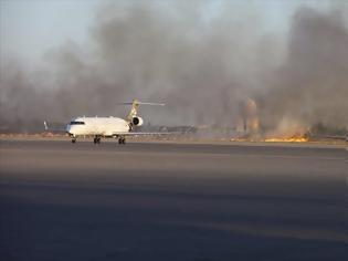 Φωτογραφία για Λιβύη: Μάχες με οβίδες στον τερματικό σταθμό του αεροδρομίου της Τρίπολης