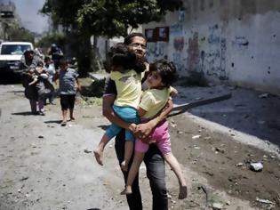 Φωτογραφία για Το Ισραήλ έπνιξε τη Σατζάιγια της Γάζας στο αίμα των αμάχων